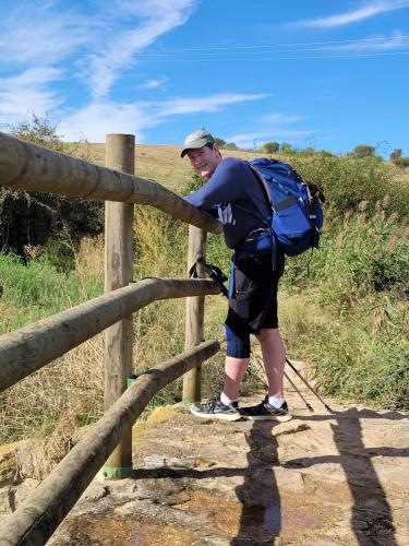 Stopping on an old wooden bridge for a quick break