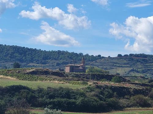 Typical scene with old church on a hill