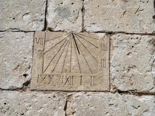 Sundial on the outside wall.of the church...and accurate!