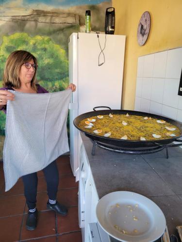 Pili and her giant pan of paella! So good.