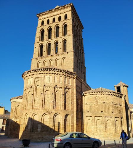 Church of San Lorenzo, built of narrow brick and somewhat unique. Back view of bell tower.