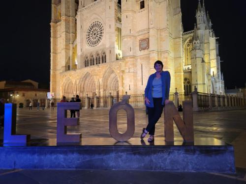 People pose at this sign singly or in groups