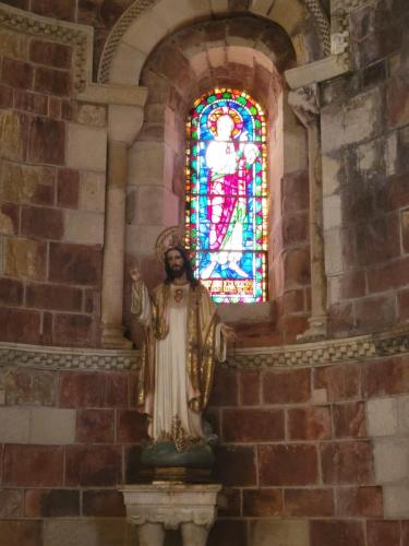 The sacred heart of Jesus to the right of the altar