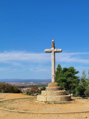 Pilgrim cross at the top.