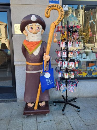 Pilgrim outside a store