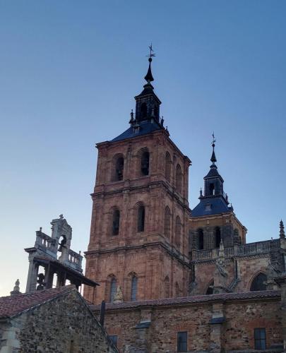 A view of the cathedral from the back and side with its twin towers.