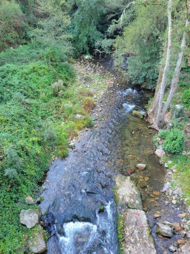 Looking down along it from a bridge