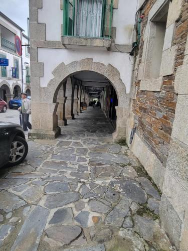 Looking down the covered breezeway where our hostal is located.