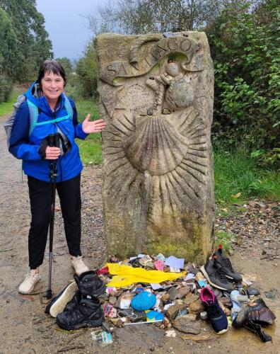 Camino de Santiago sculpture adorned with momentos.