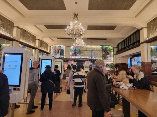 Place your Big Mac  fries order underneath crystal chandeliers