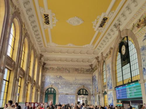 Inside the train station...vibrant ceilings  scenes on hand-painted signs