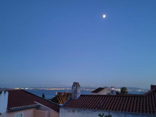 Moon over Lisbon